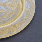 Metal dish specified in the style of Zlatoust engraving