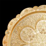 Gold dish with oriental ornament