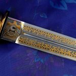 UAE golden coat of arms on a knife blade