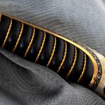 Exclusive oriental knife with a manual pattern