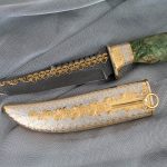 An example of souvenir weapons, a handmade knife. This is an option of a gift to a man that will definitely not remain idle.