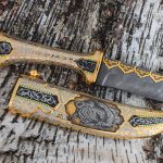 Golden Knife - Wolf. The decor of the knife is made in oriental style.