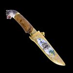 Wild wolf on the sheath of a gift knife knife