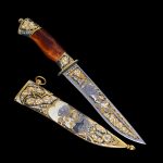 Decorated gift knife for interior decoration. Luxurious handmade