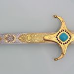 Gold sword blade decorated with gold pattern