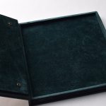 Velvet casket upholstery for storing a precious necklace. Luxurious jewelry packaging.