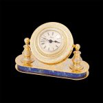 Handmade gold table clock based on natural lapis lazuli
