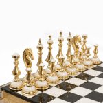 Golden chess – Classic Handmade chess is a gift, an example of interior design, the modern Zlatoust art of stone and metal treatment with artistic and collection value.