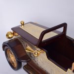 Exclusive interior item - wooden car model covered with gold