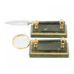 Magnifier and knife with a jade handle and a jade base.
