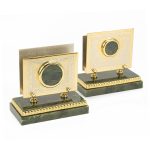 Gold business card holders for jade cabochons.