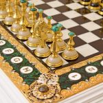 chess pieces with gold and natural stones