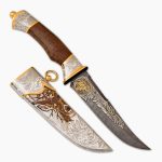 Knife with decorated scabbard