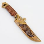 Gift knife with golden sheath