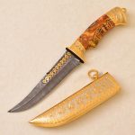 Golden decorated Damascus steel knife
