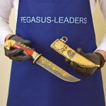 gold knife with a falcon from Pegasus Leaders