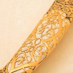 Decorative figured overlays of gold on enamel