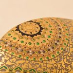 Gold plating with enamel and stones