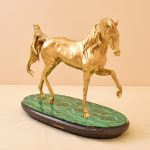 horse figurine in gold color