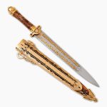 Collectible gift dagger with a high-alloy steel blade. The blade is decorated with a gold pattern.