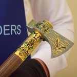 Enamelled Damascus steel ax