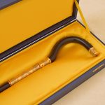 golden cane in box