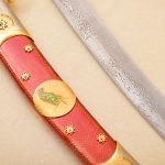 damasscus steel and red scabbard