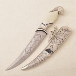 Gift knife with a handle in the form of a falcon's head buy in the UAE