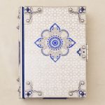 Quran of White and Blue Color